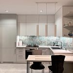 Світло-сіра кухня в стилі мінімалізм